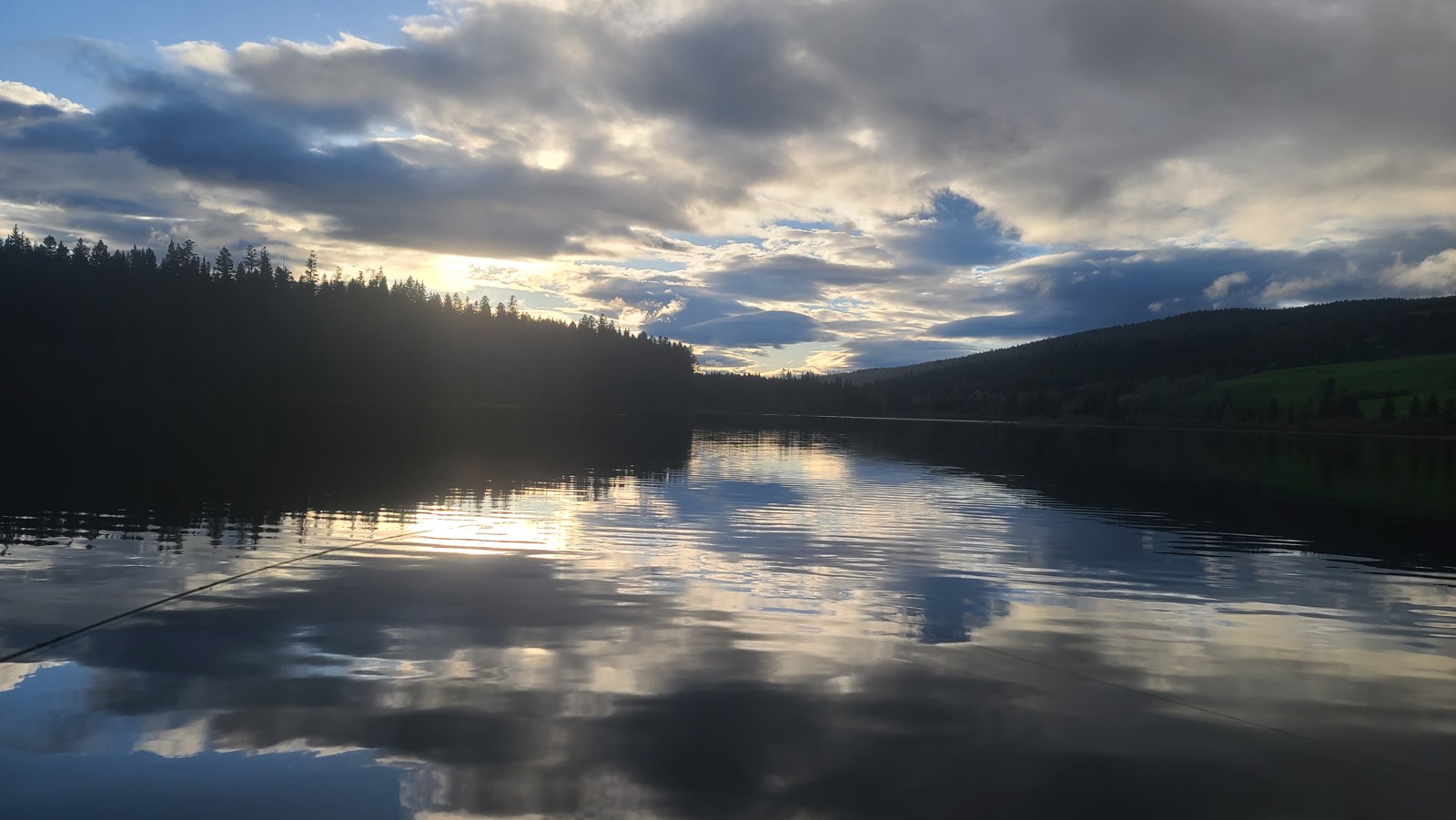 Evening light over stillwater camp